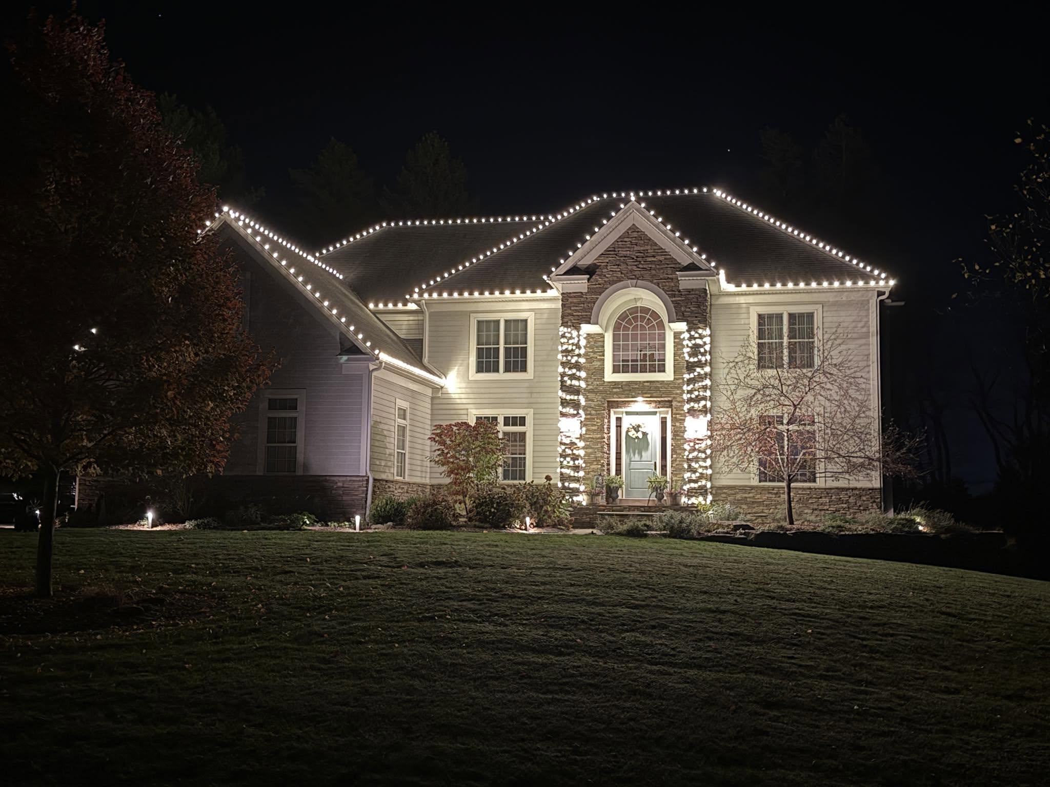 Warm white roofline & entry lighting