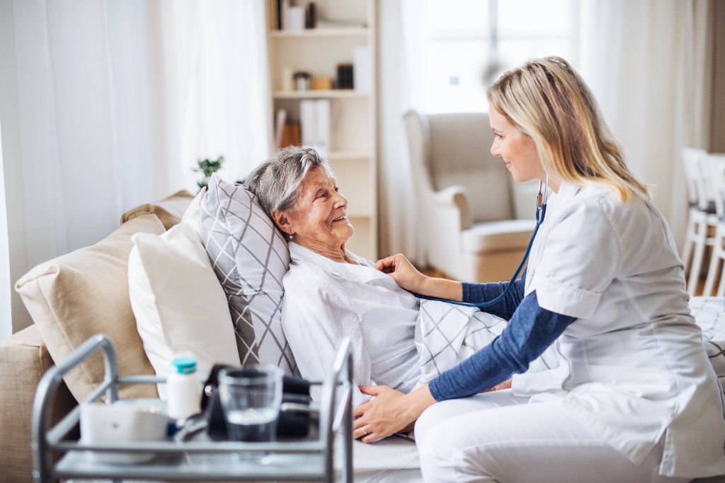 Caring healthcare professional with patient