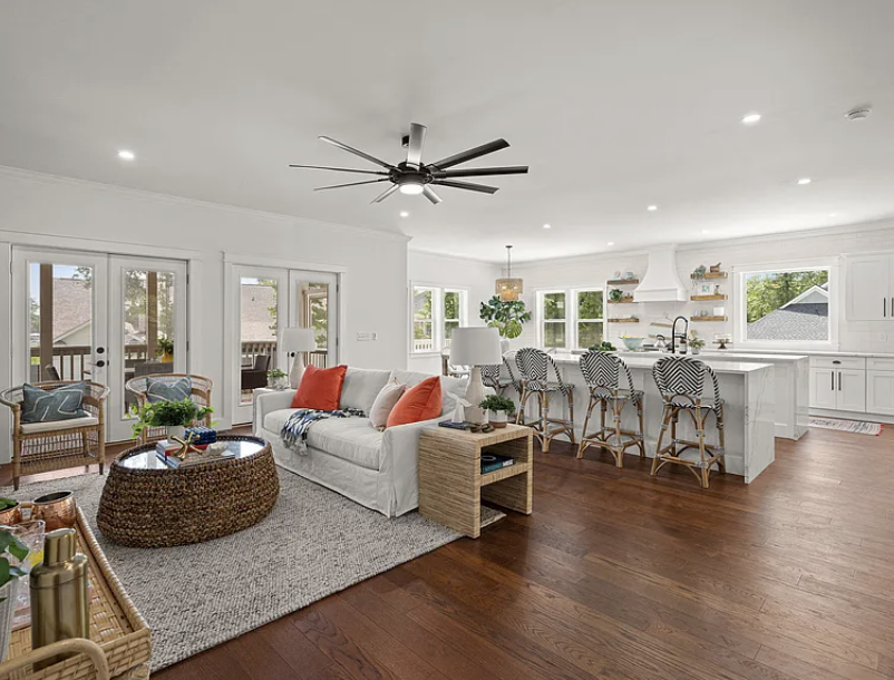 Living room flowing into kitchen with French doors