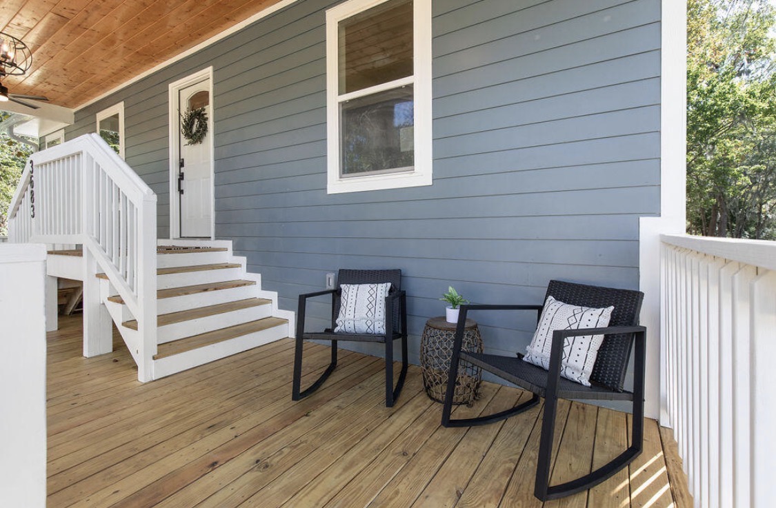Front porch with wicker rocking chairs