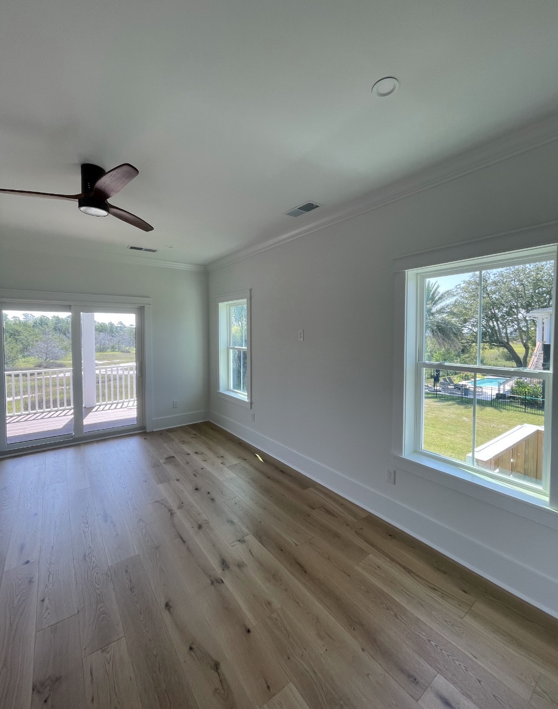 Bedroom with sliding glass door to balcony