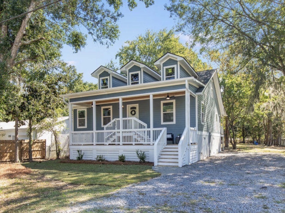 Home addition Charleston SC - elevated two-story home with wide covered front porch and dormers