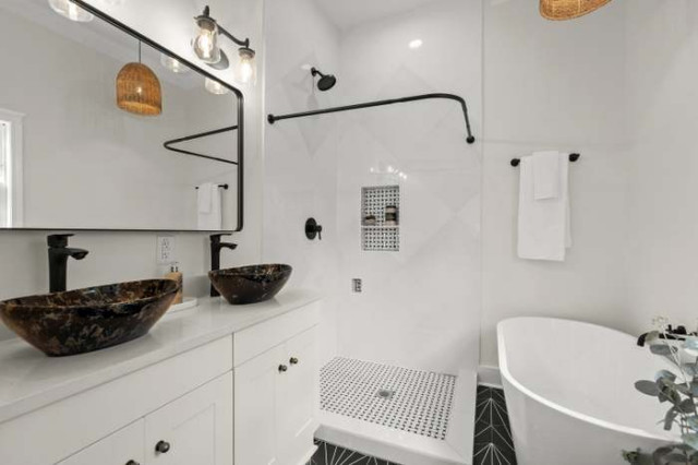 Dual vanity with stone vessel sinks and woven pendants