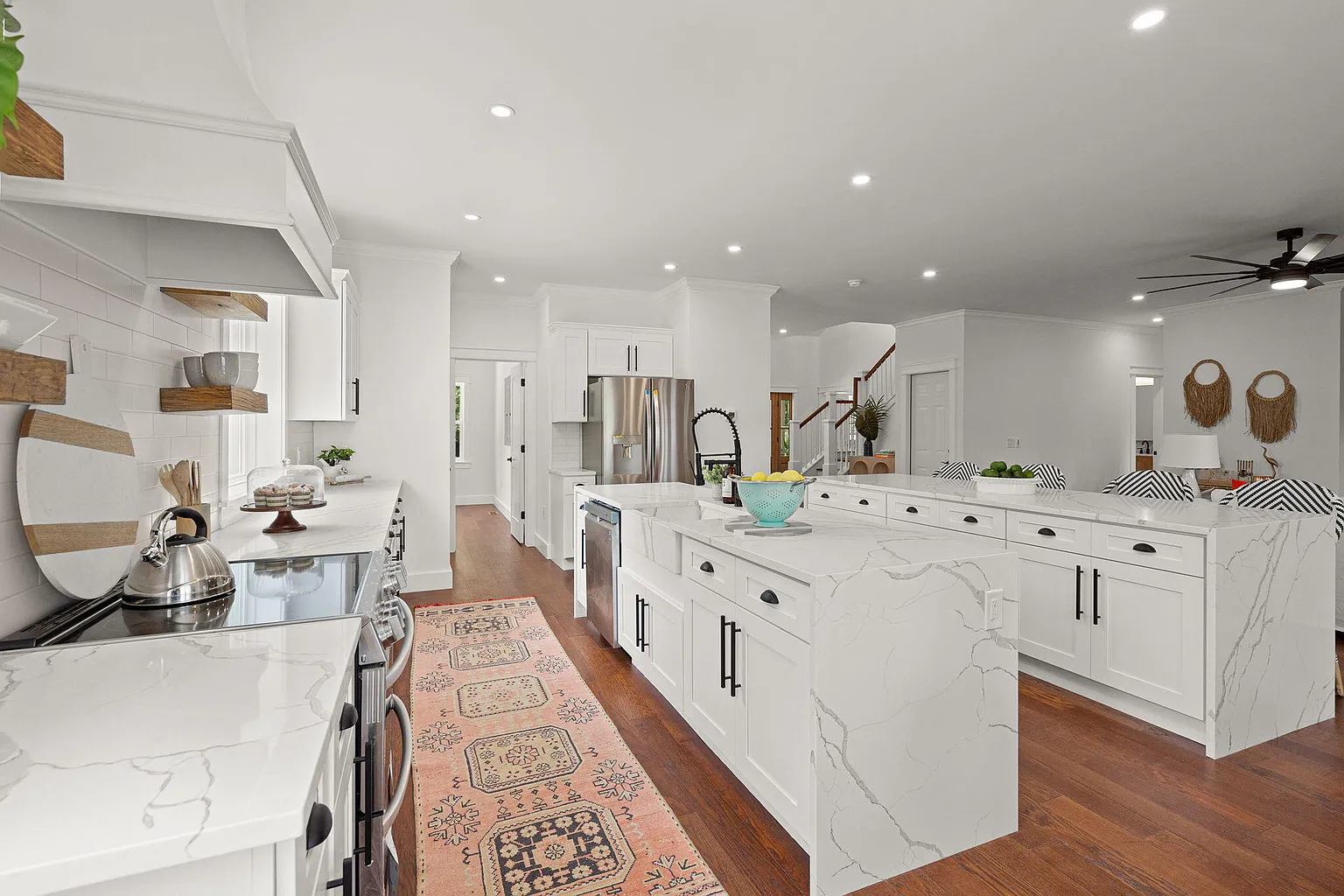 Kitchen workstation with range hood and view to living room