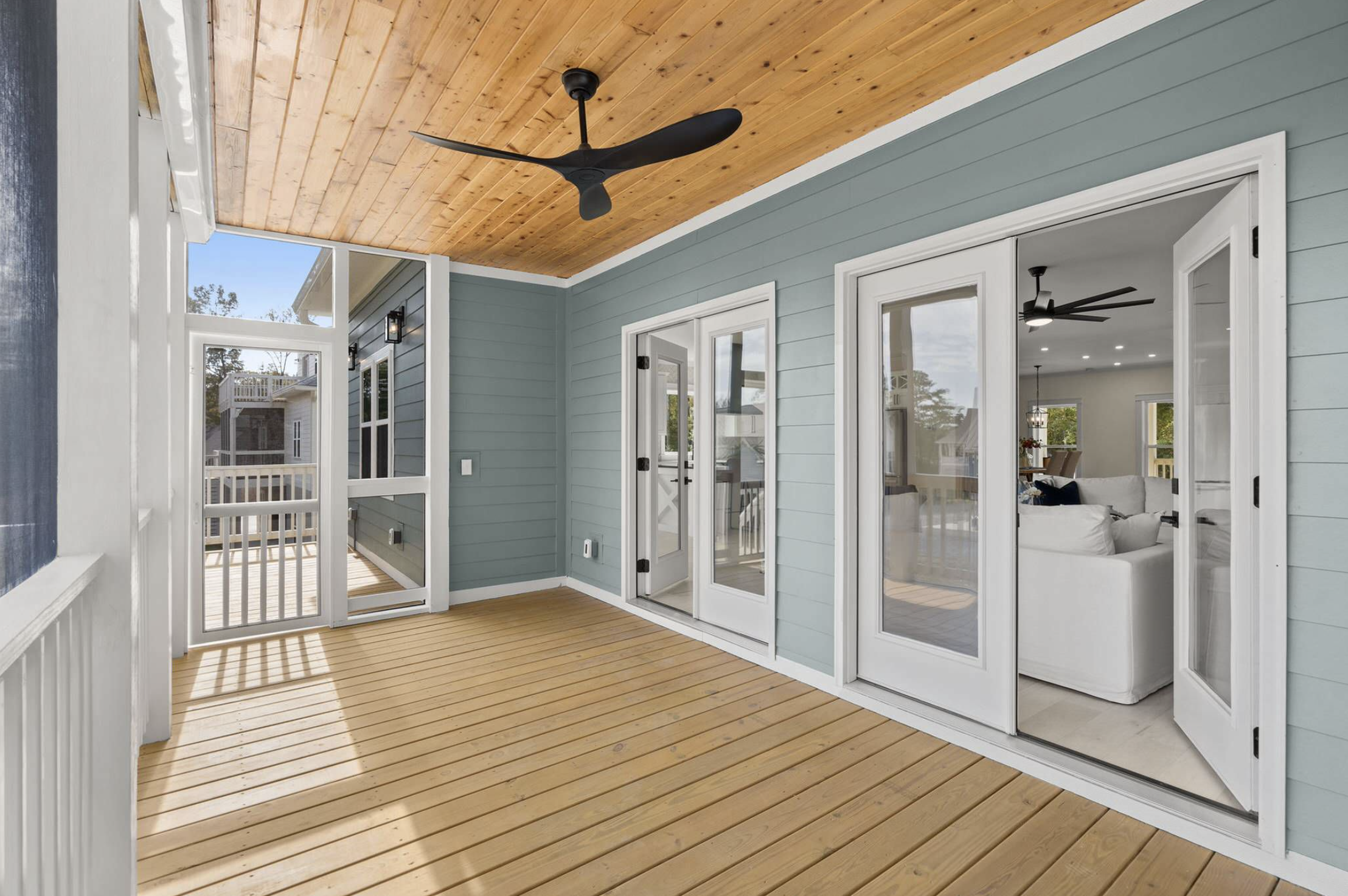 Screened porch with wood ceiling and French doors