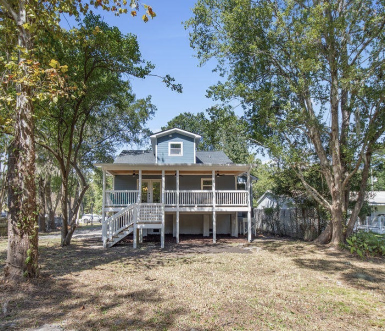 Rear exterior with elevated deck and gable dormer