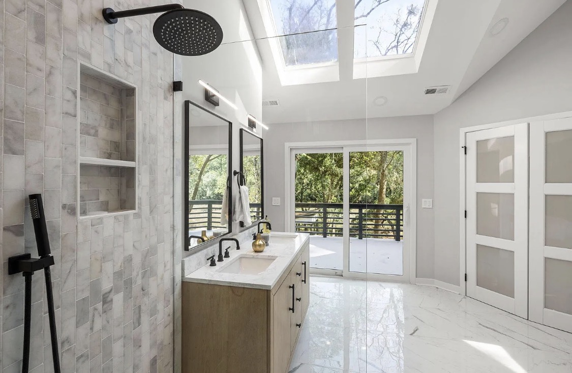 Walk-in shower and double vanity in the primary bathroom