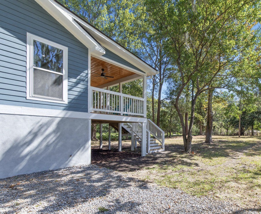 Side-angle exterior view of raised home