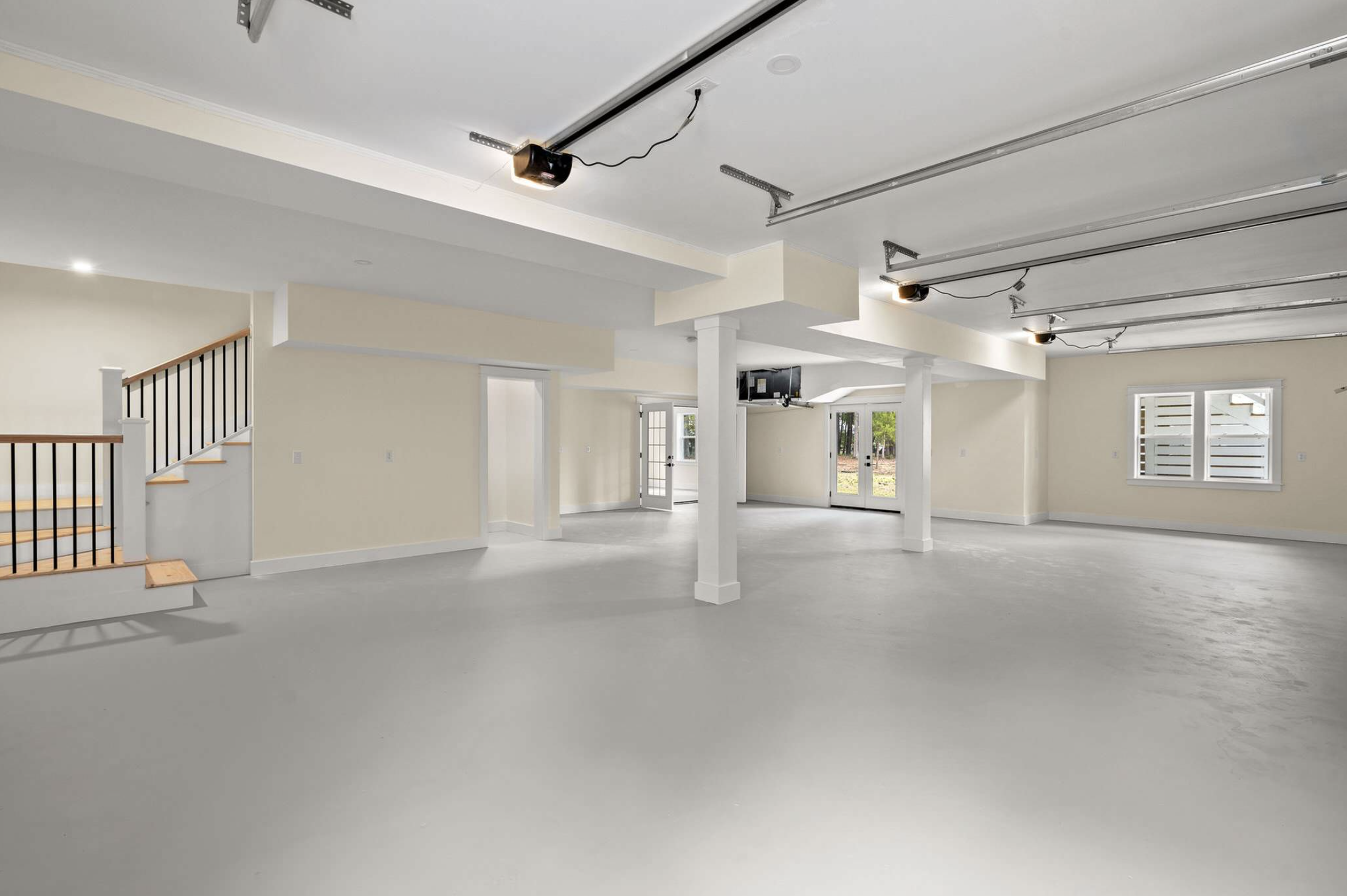Ground-level garage with stairs to main floor