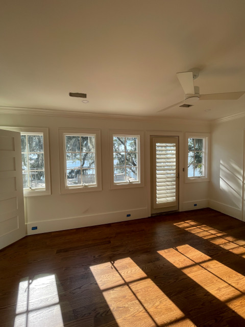 Bright unfurnished room with plantation shutters