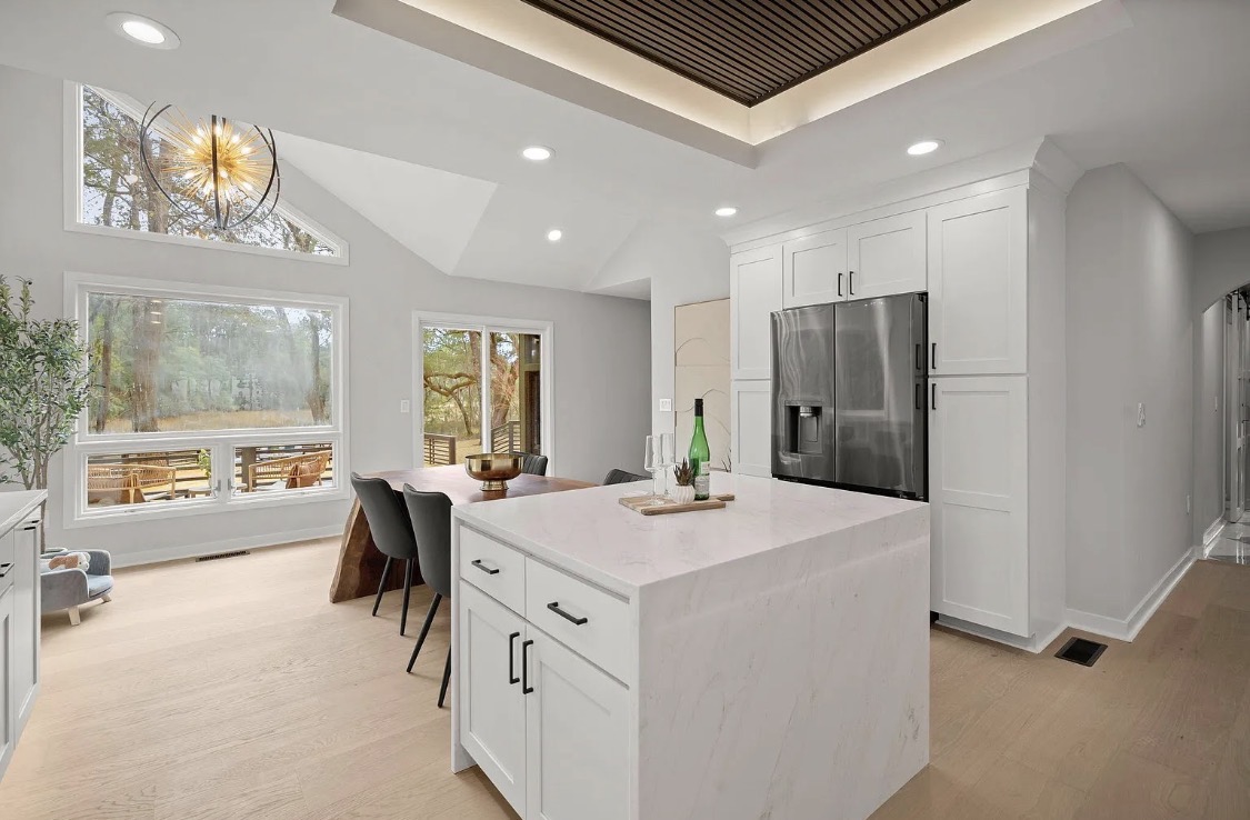 Open kitchen and dining area with live-edge table