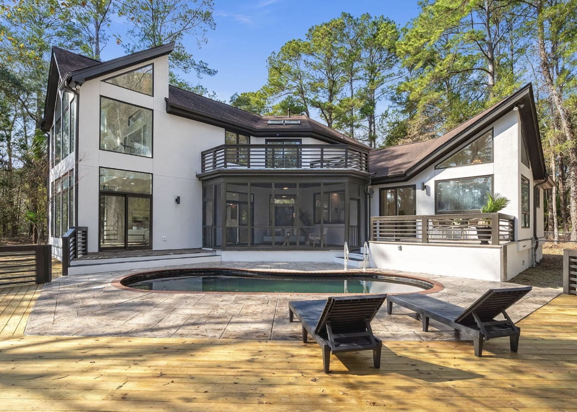 Rear screened porch with pool and patio