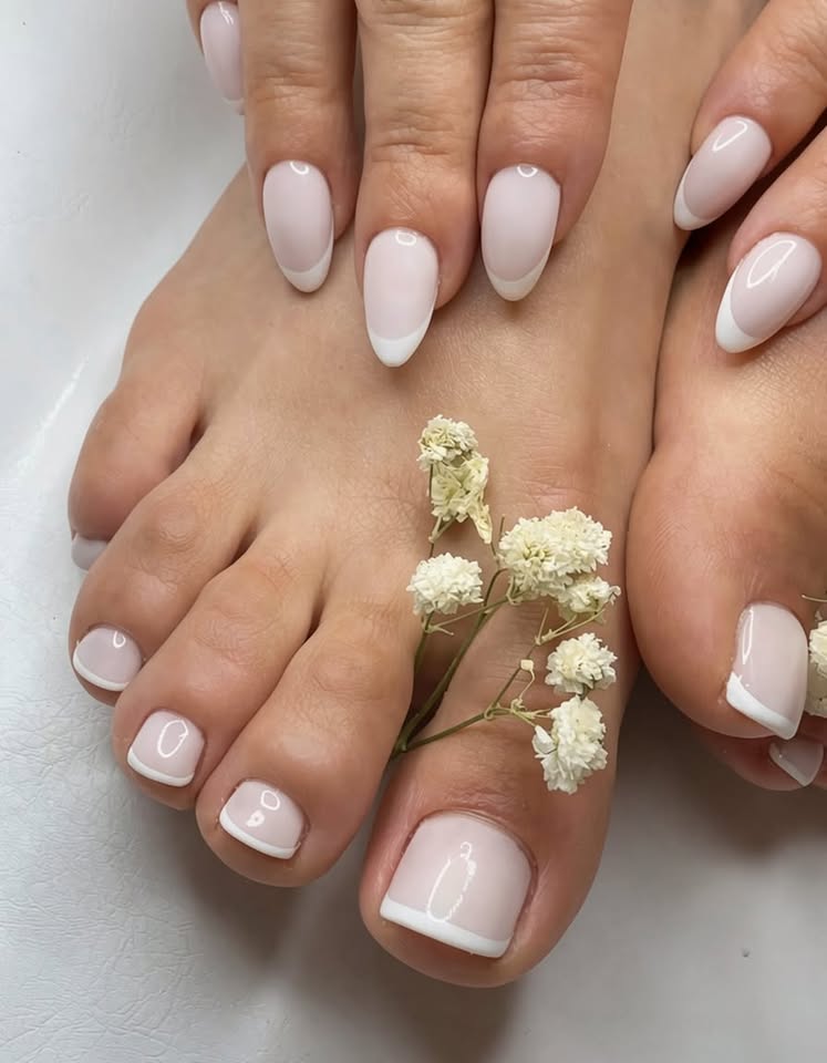 Matching French finishes on fingernails and toenails