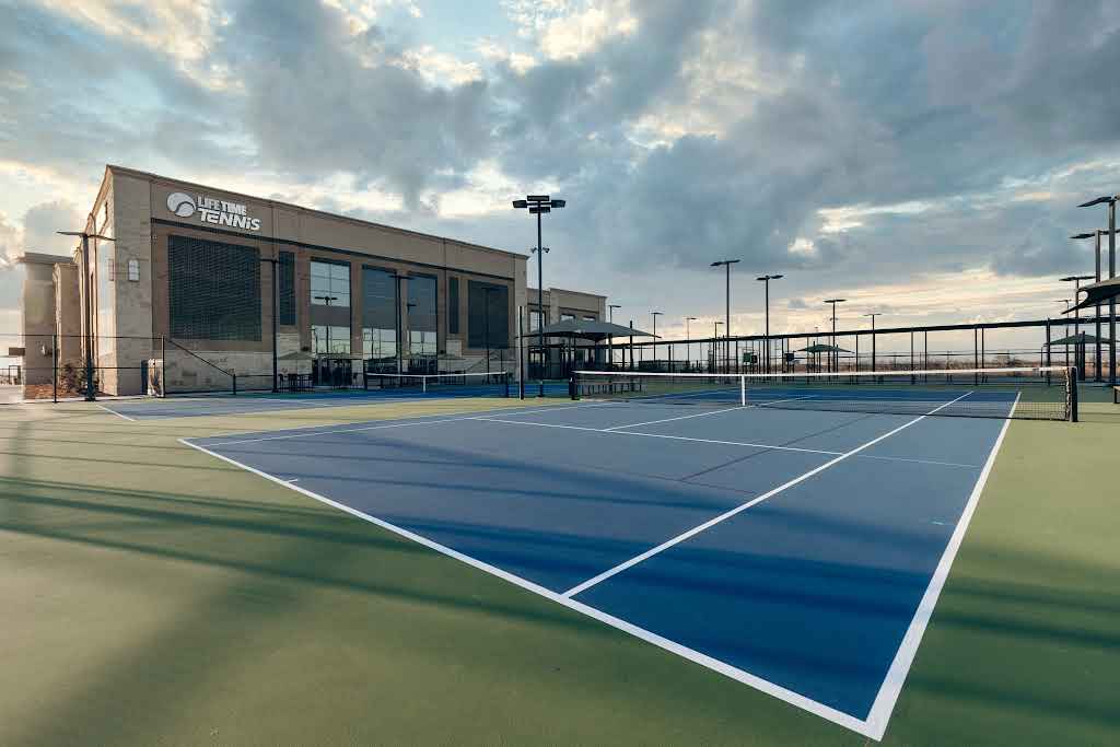 Life Time branded outdoor tennis courts at Frisco