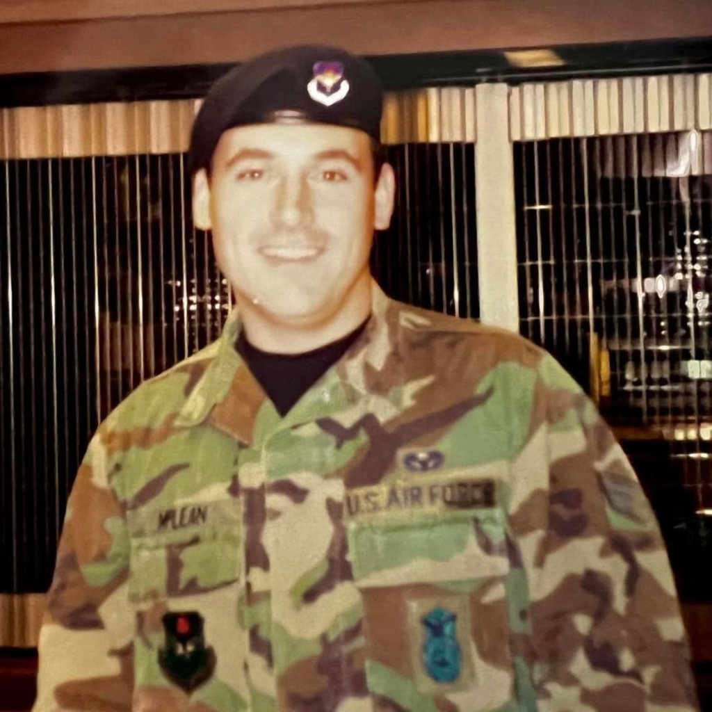 US Air Force veteran in woodland camouflage and black beret