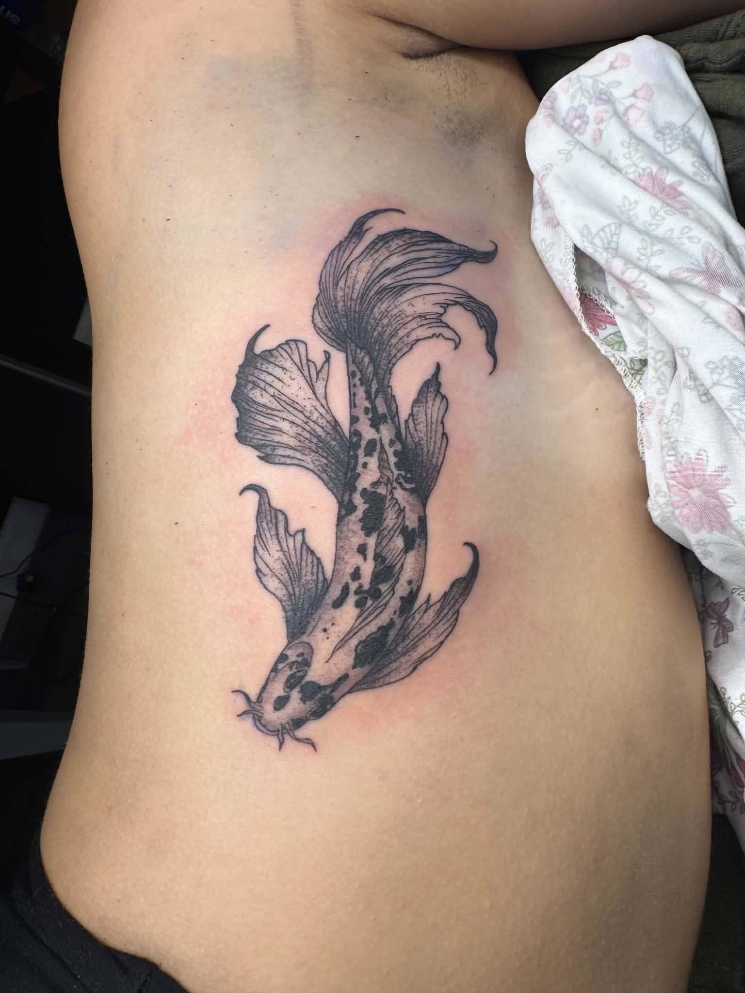 Koi fish torso tattoo