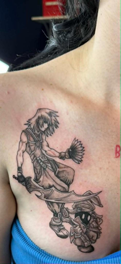 Final Fantasy character chest tattoo