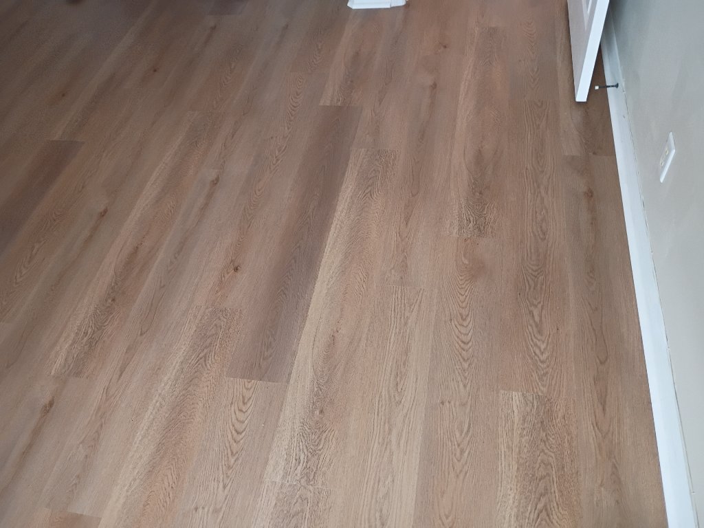 XPR Standard Wismar Oak luxury vinyl flooring installed throughout residential hallway by PTAH Flooring