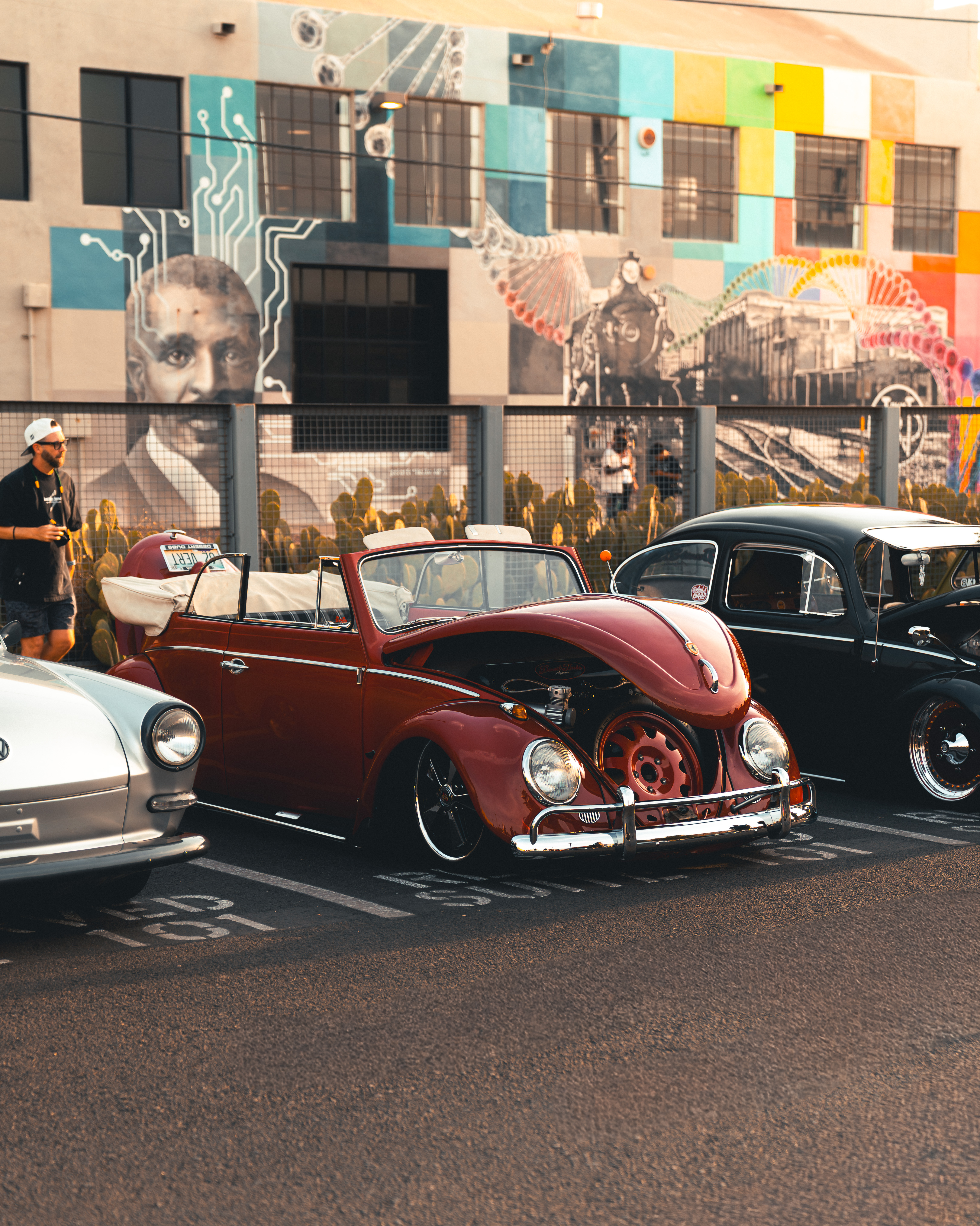KyushaClub X CoffeeDrunk Cars & Coffee - photography automotive photography by Chan2blazed Media: KyushuClub x CoffeeDrunk Cars & Coffee meet — a golden-hour gathering of vintage air-cooled VWs, a classic Porsche, and a lime-green Honda N600 with an open engine bay.