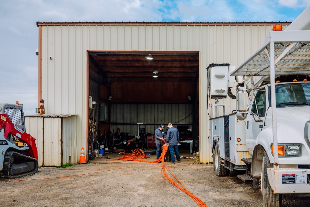 CRANETEC technicians inspecting utility fleet Orlando FL mobile maintenance