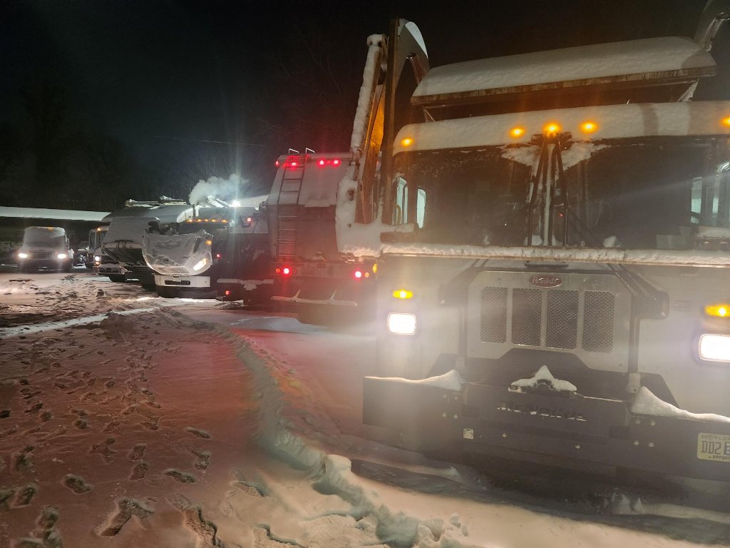 Total Waste commercial garbage trucks serving Maryland businesses