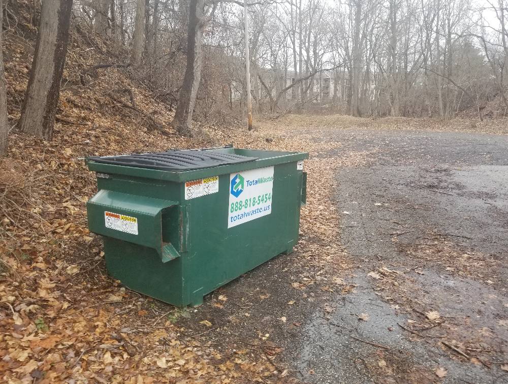 2 Yard Commercial Dumpster in use