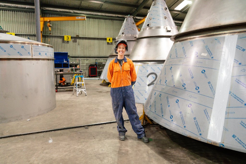 Young woman in manufacturing workshop