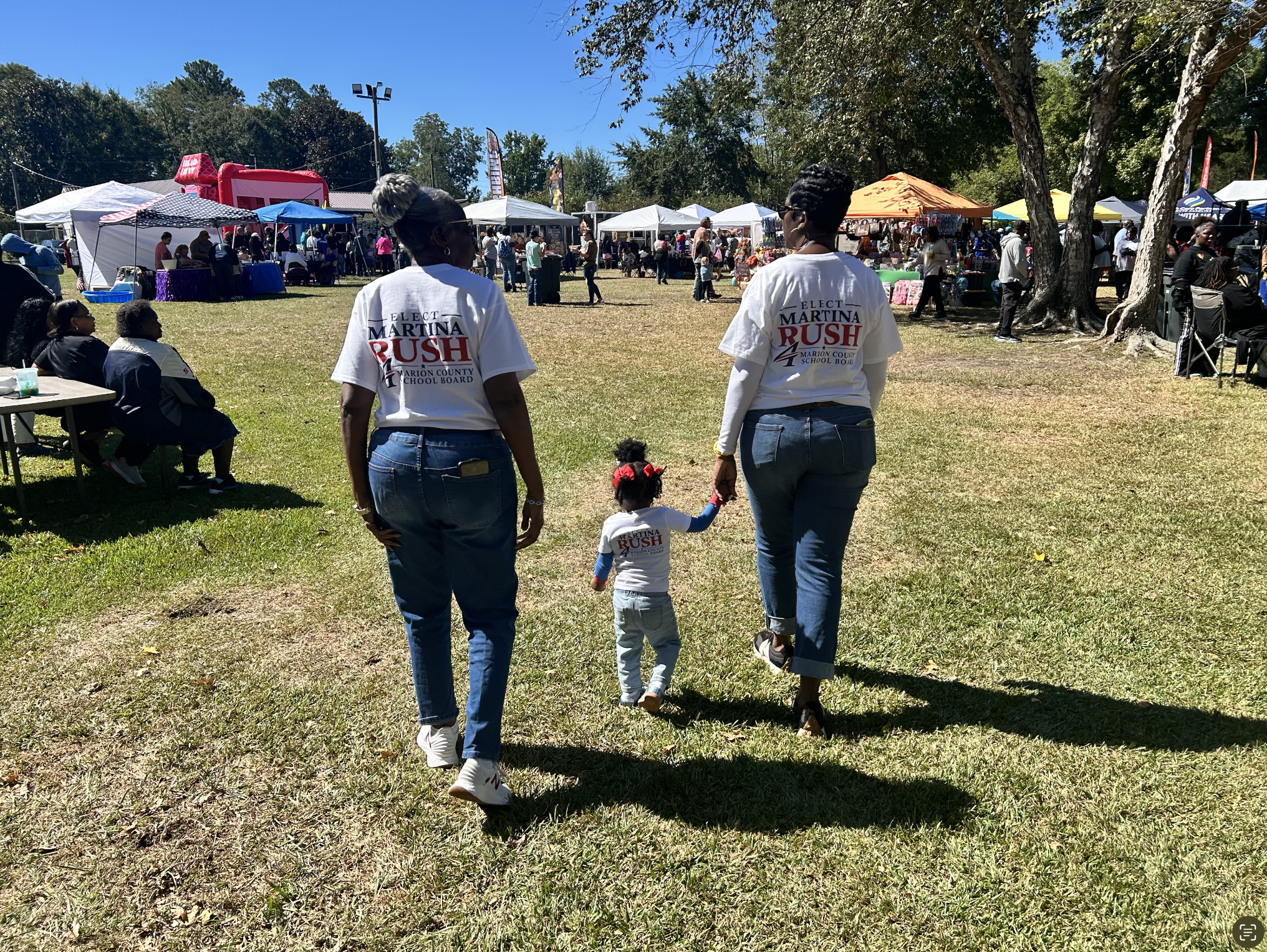 Walking together through the Golden Leaf Festival grounds
