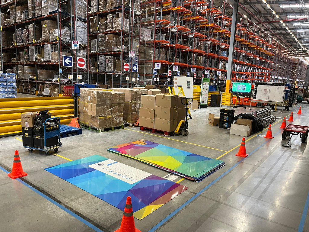 LBA2 branding along the full warehouse perimeter