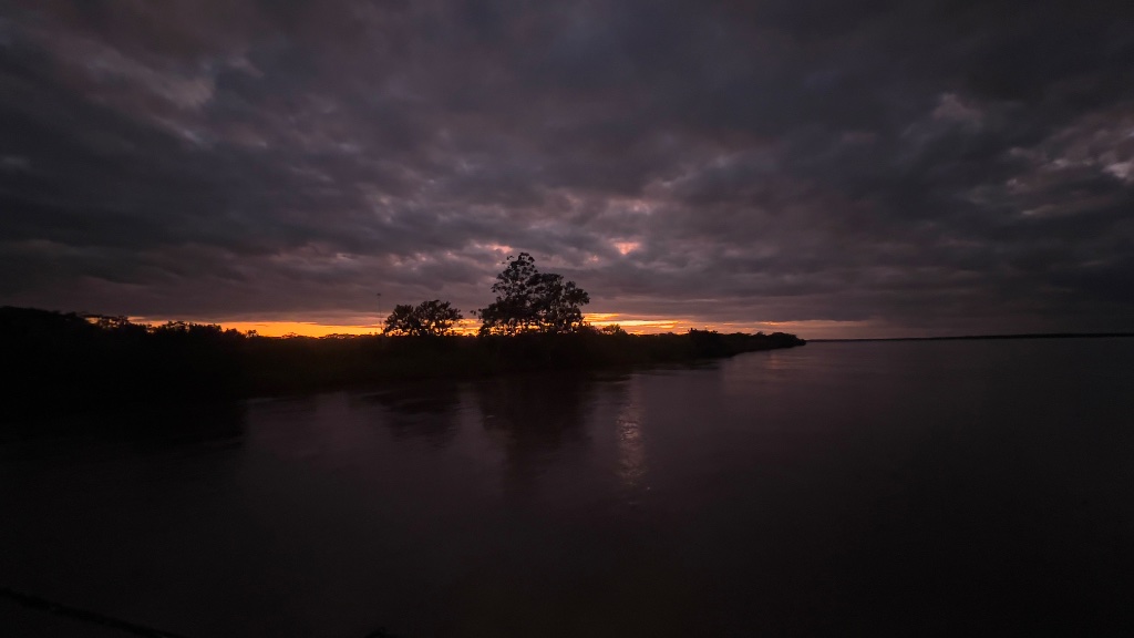 Across the Amazon — the river at sunset as the day of travel closes