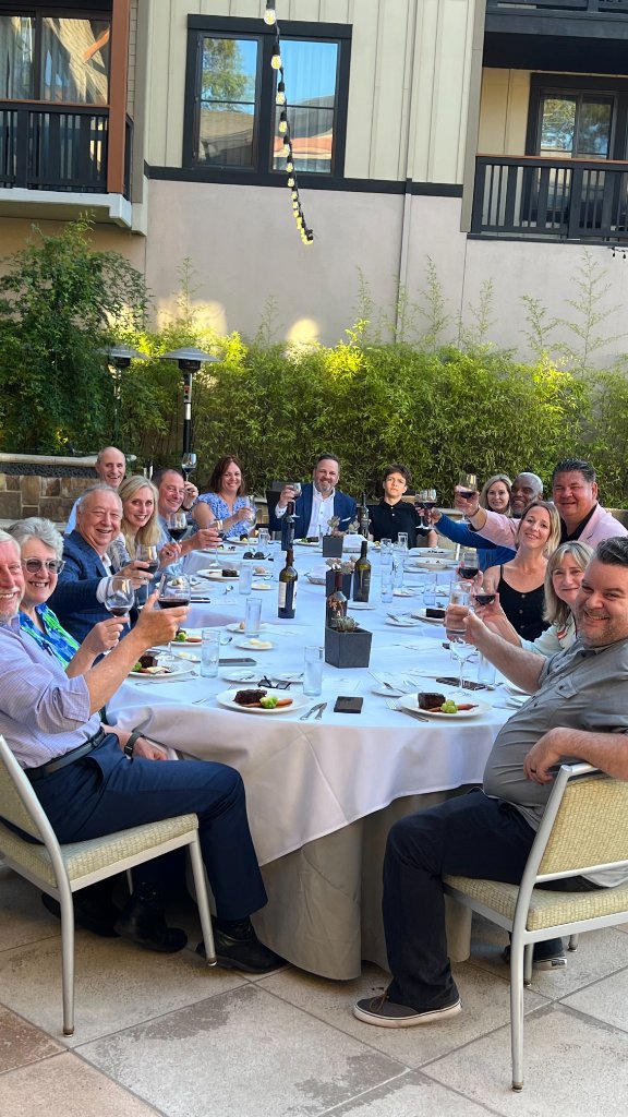 Long-table dinners under the lights.
