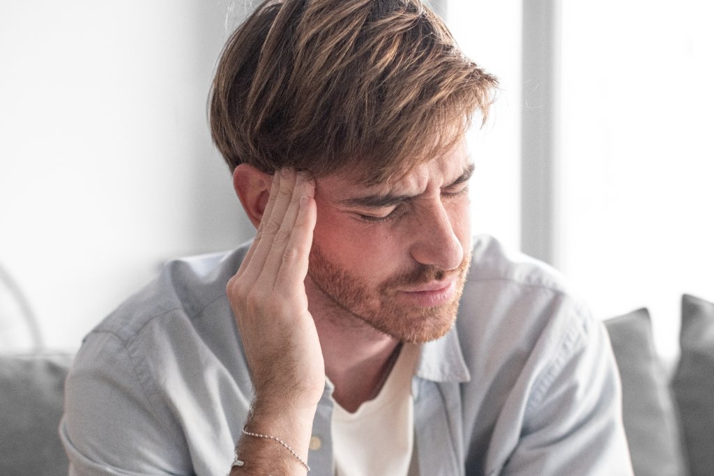 Patient experiencing chronic migraine
