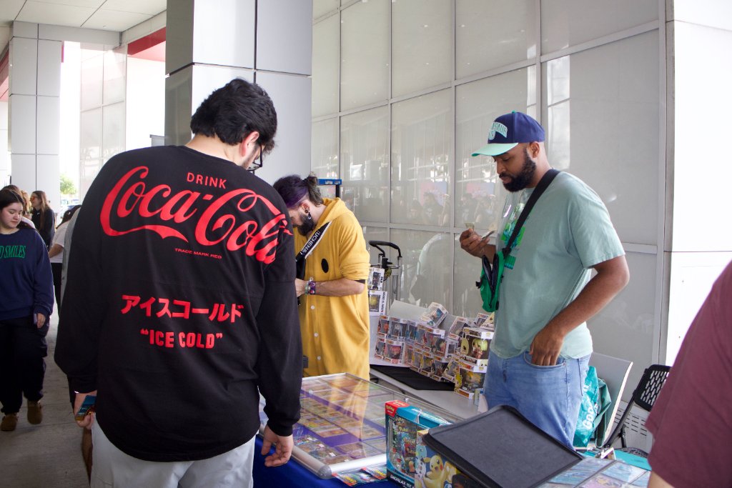 Attendees with Pokemon Costume Dog
