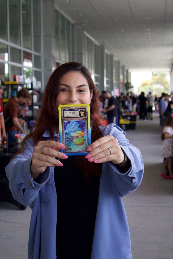 Attendee with Graded Pokemon Card