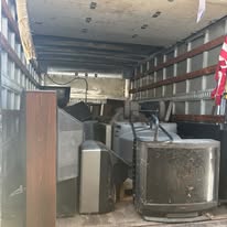 Box truck loaded with electronics and furniture
