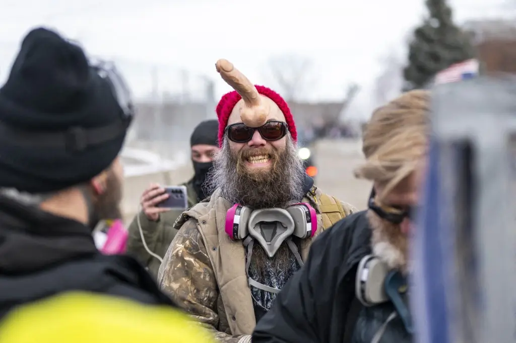 Close-up of aggressive protester at anti-ICE rally in Minneapolis