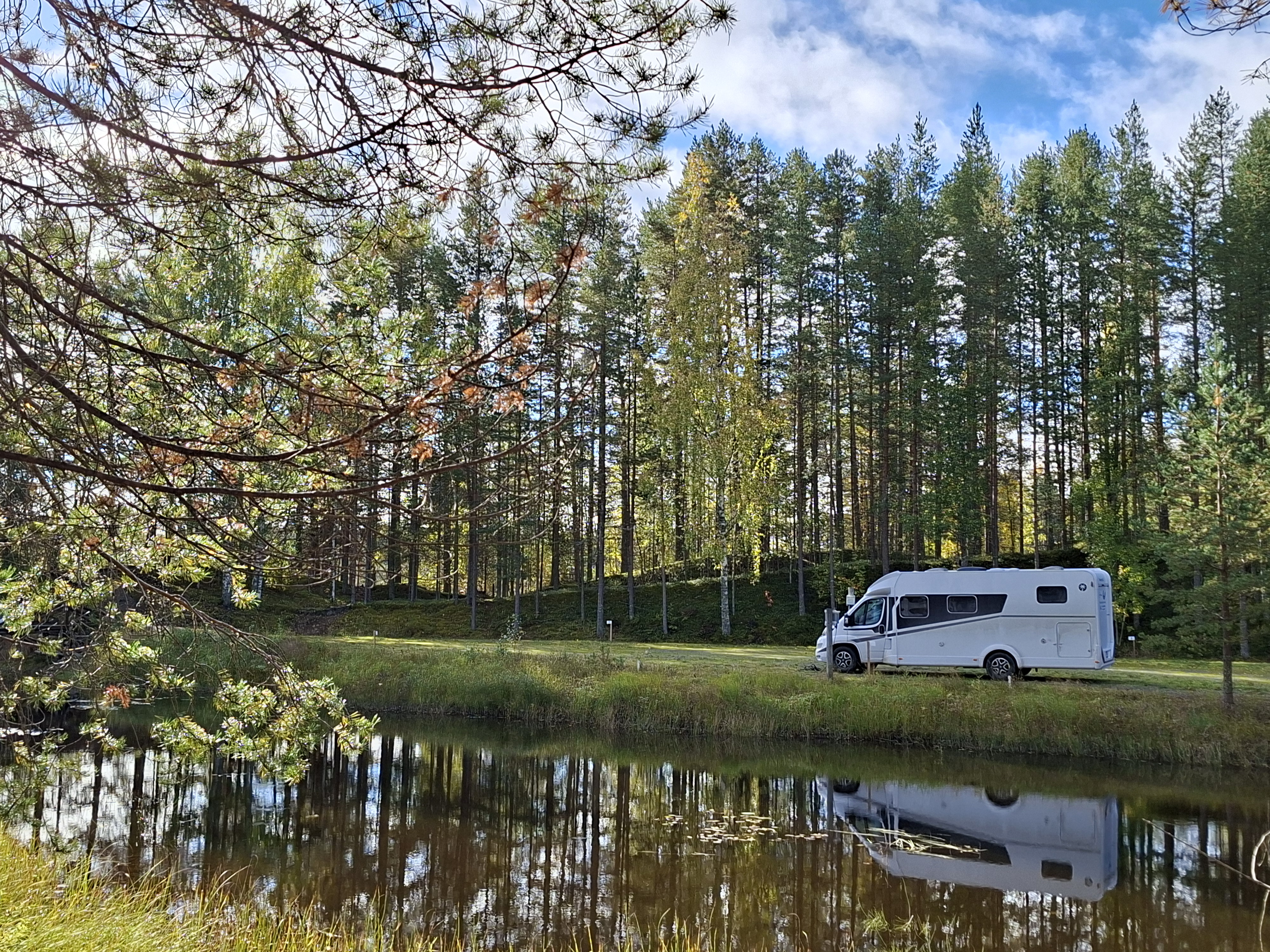 Motorhome parked by a lake in Finland