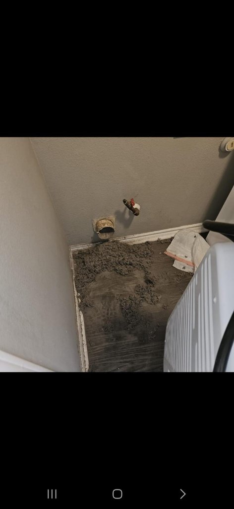 Before and after dryer vent cleaning behind a dryer
