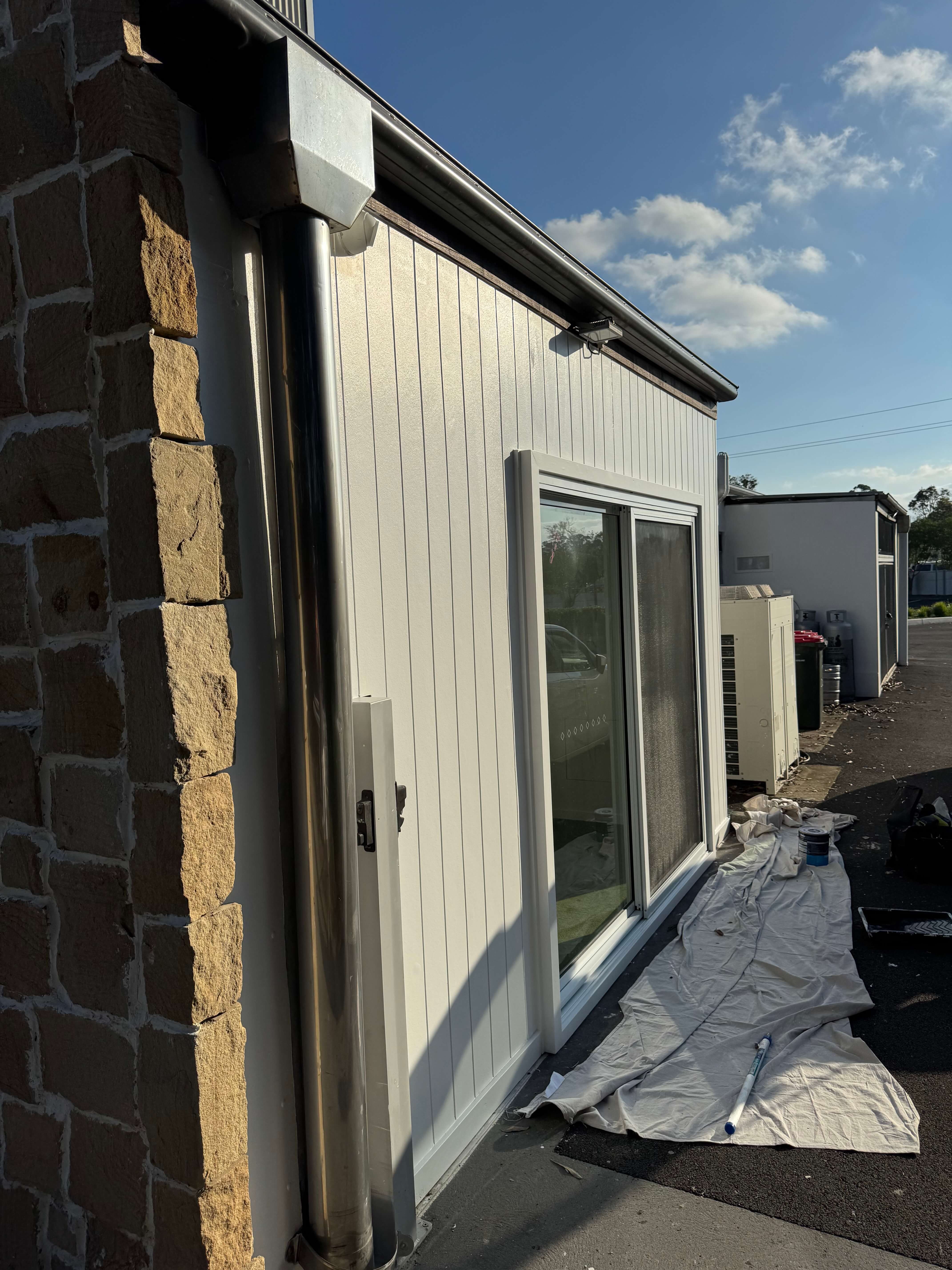 Stone & cladding refresh before and after in Wandandian