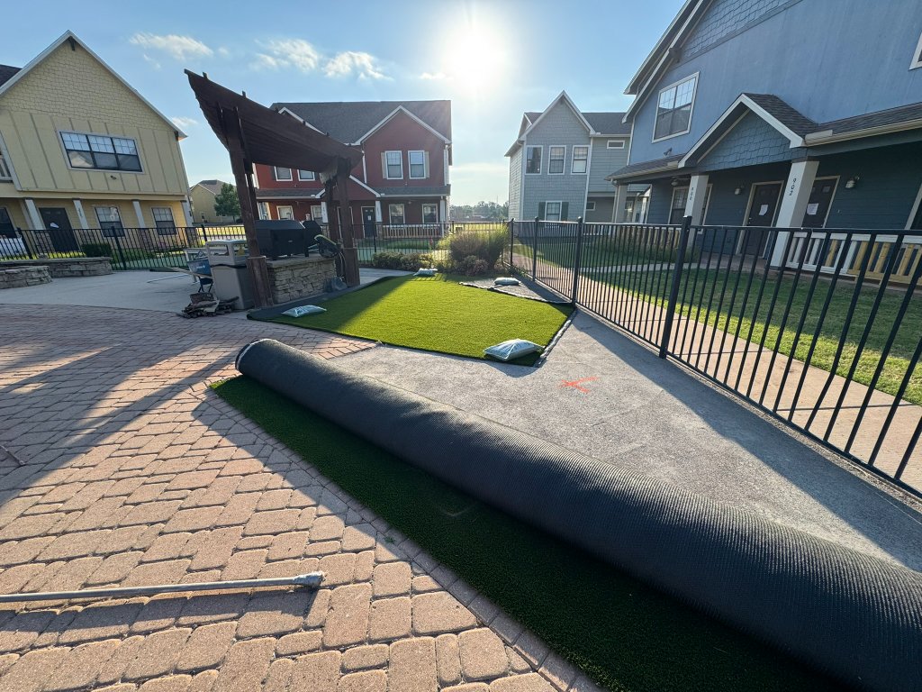 Cottage Row clubhouse artificial turf and landscaping project in Stillwater Oklahoma