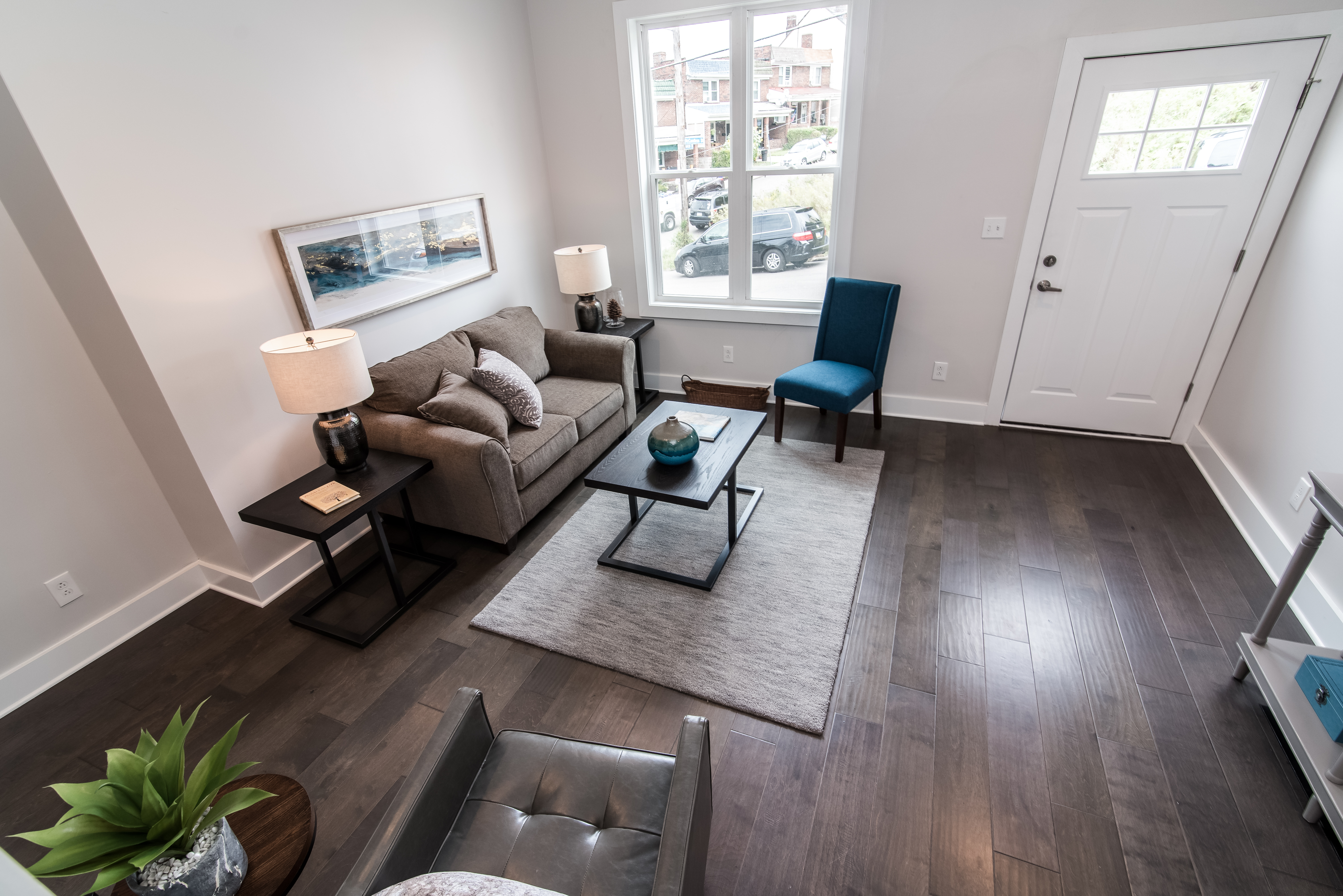 Staged living room with modern furniture and natural light