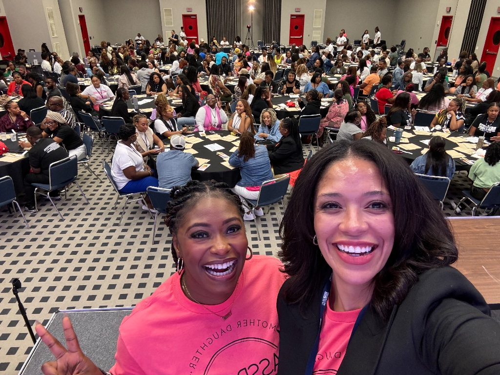 Lacey with large conference audience