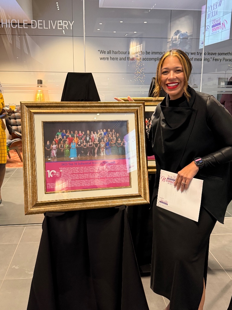 Lacey receiving Top 30 Influential Women award