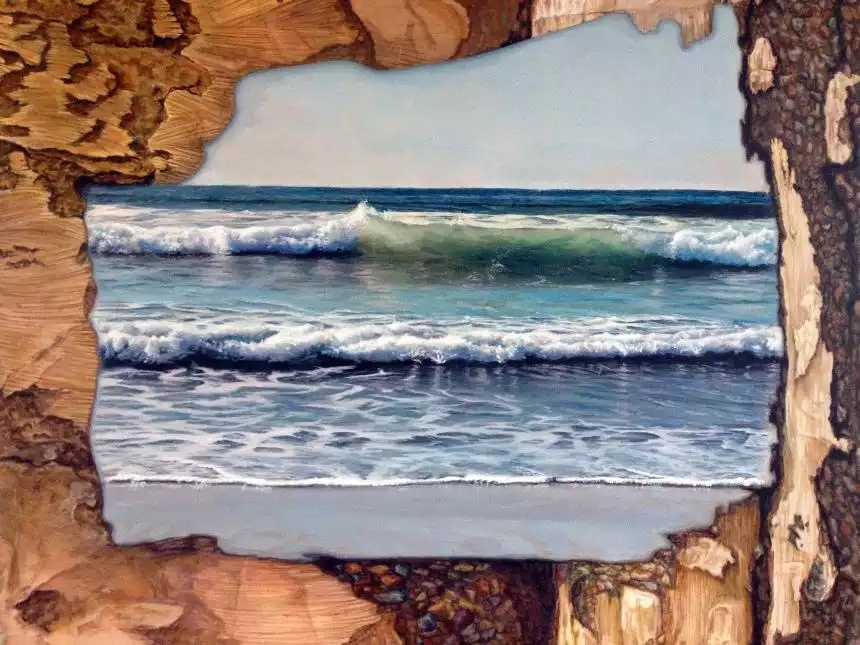 Ocean scene painting framed in rustic wood
