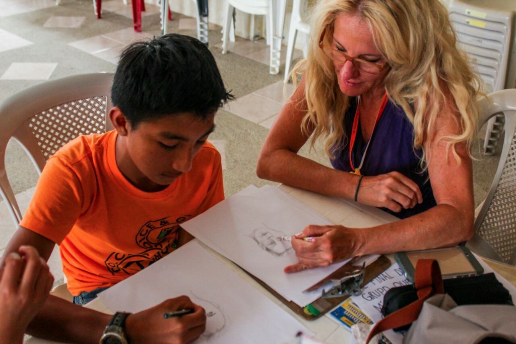 Amelie teaching art