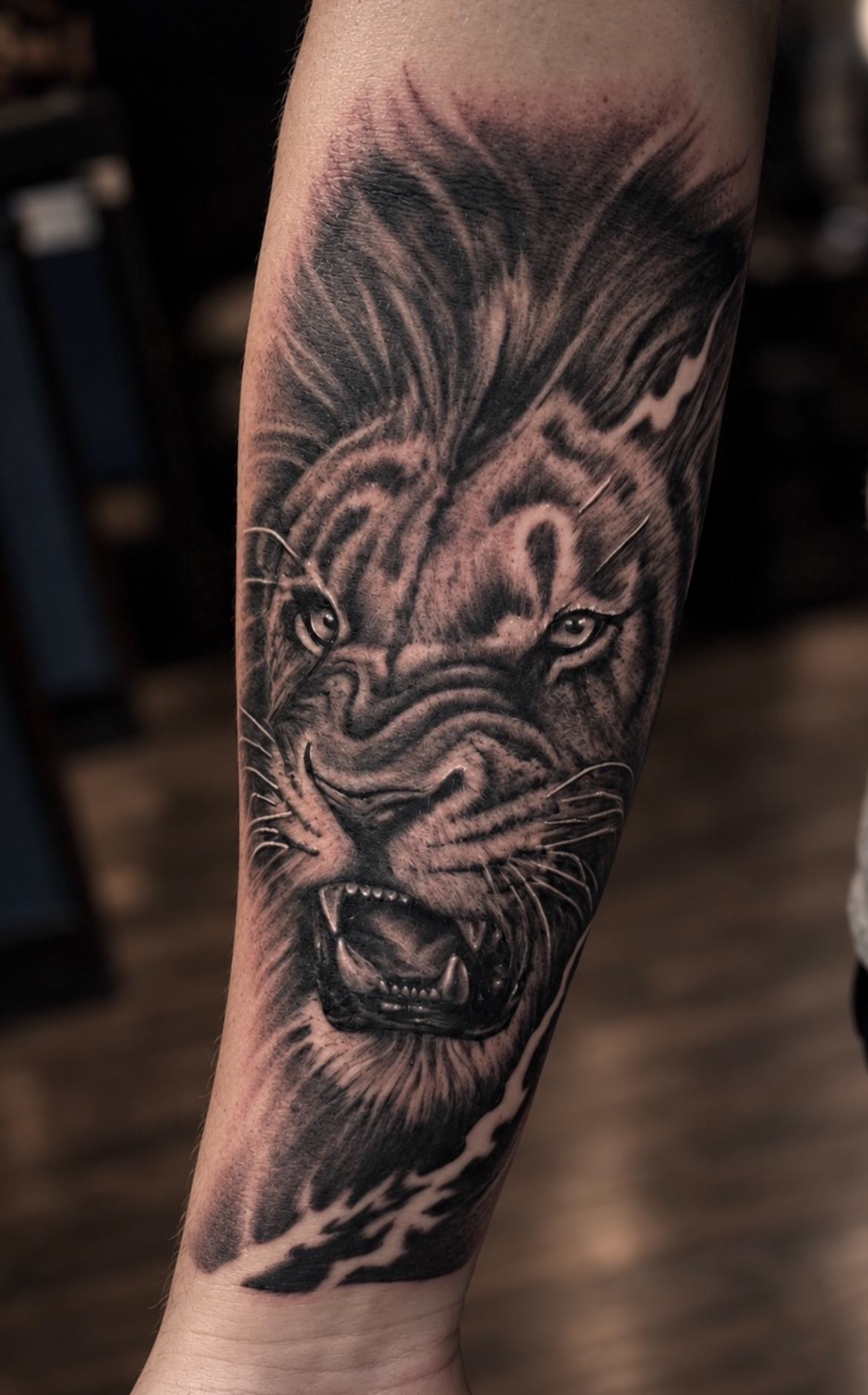 Black and Grey Realism Lion Tattoo