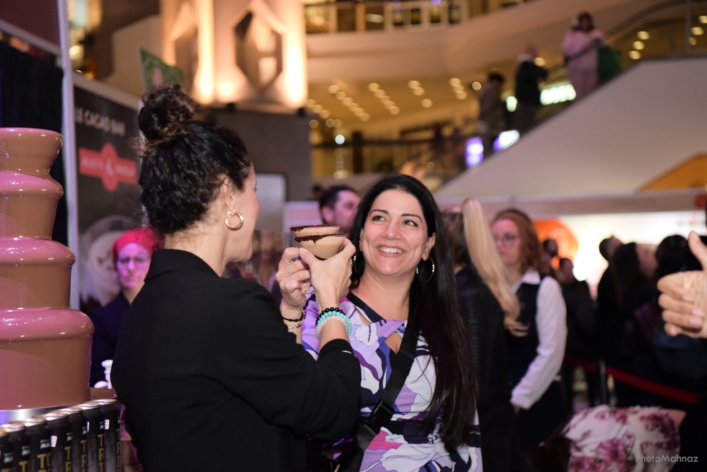 Cocoa Bar experience — chocolate fountain and guests at Salon du Chocolat