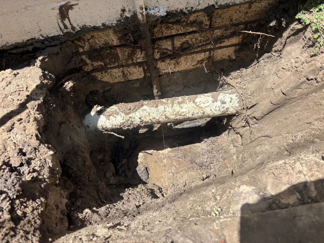 Excavated underground pipe being repaired on the Gold Coast