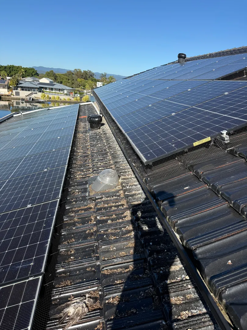 Tile roof with solar panels during a roof inspection on the Gold Coast