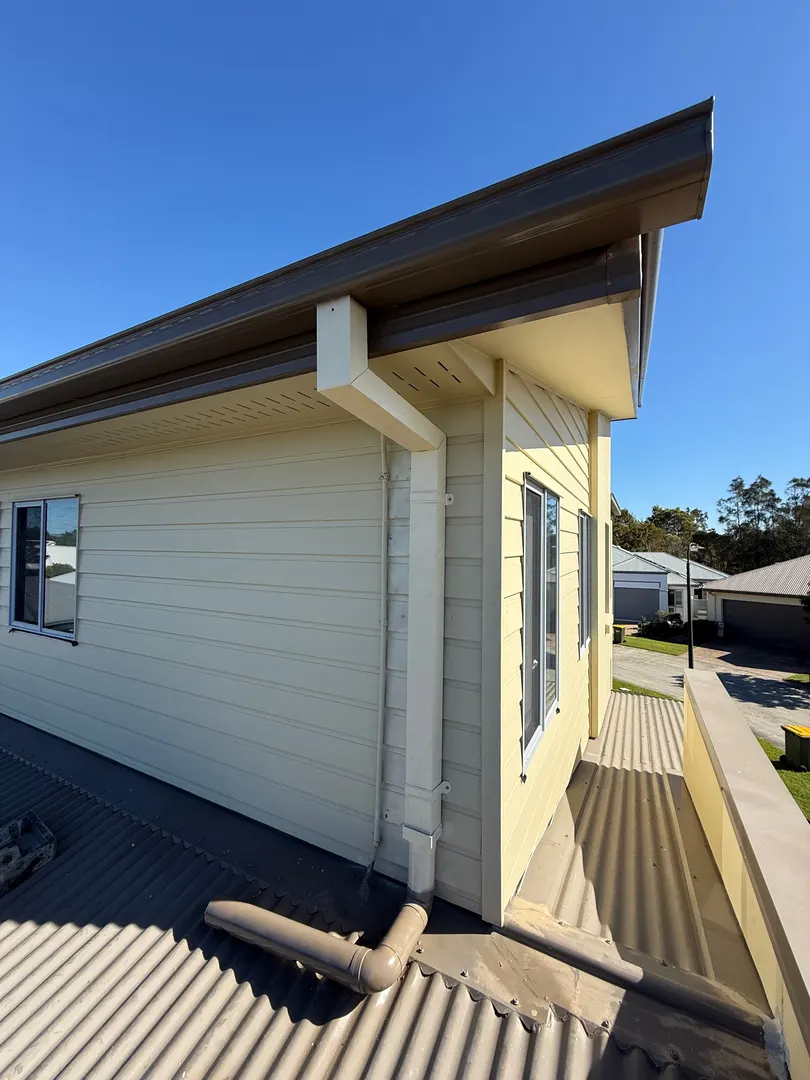 New gutter and downpipe on a Gold Coast home